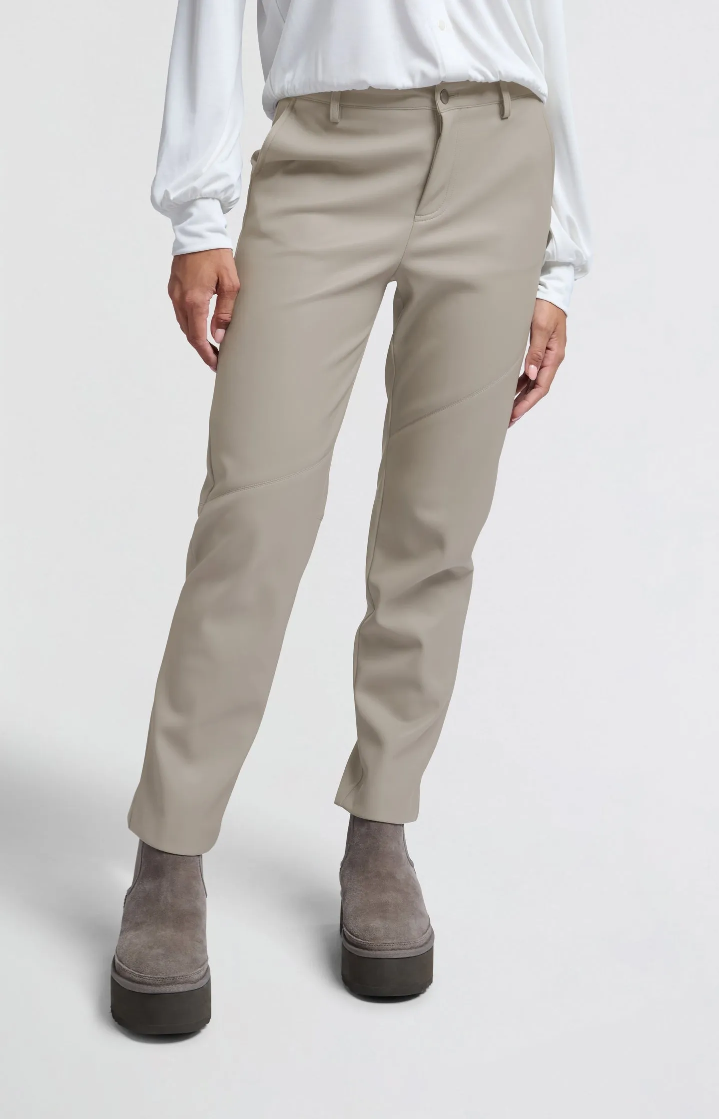 Faux leather trousers with straight legs and pockets